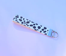 Load image into Gallery viewer, Cow Print Keychain Wristlet, Cowgirl Key Chain, Vegan Leather Key Fob, 90s Style