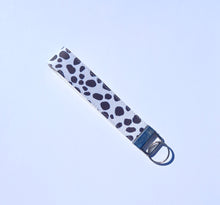 Load image into Gallery viewer, Cow Print Keychain Wristlet, Cowgirl Key Chain, Vegan Leather Key Fob, 90s Style
