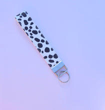 Load image into Gallery viewer, Cow Print Keychain Wristlet, Cowgirl Key Chain, Vegan Leather Key Fob, 90s Style
