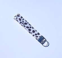 Load image into Gallery viewer, Cow Print Keychain Wristlet, Cowgirl Key Chain, Vegan Leather Key Fob, 90s Style

